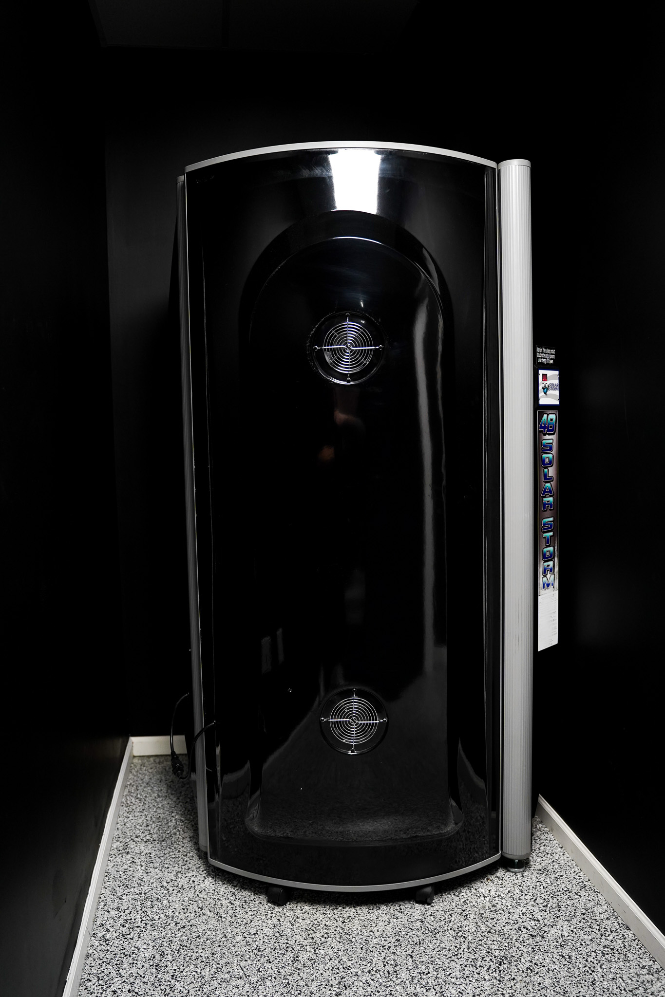 District 507 stand-up tanning booth